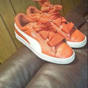Red suede pumas